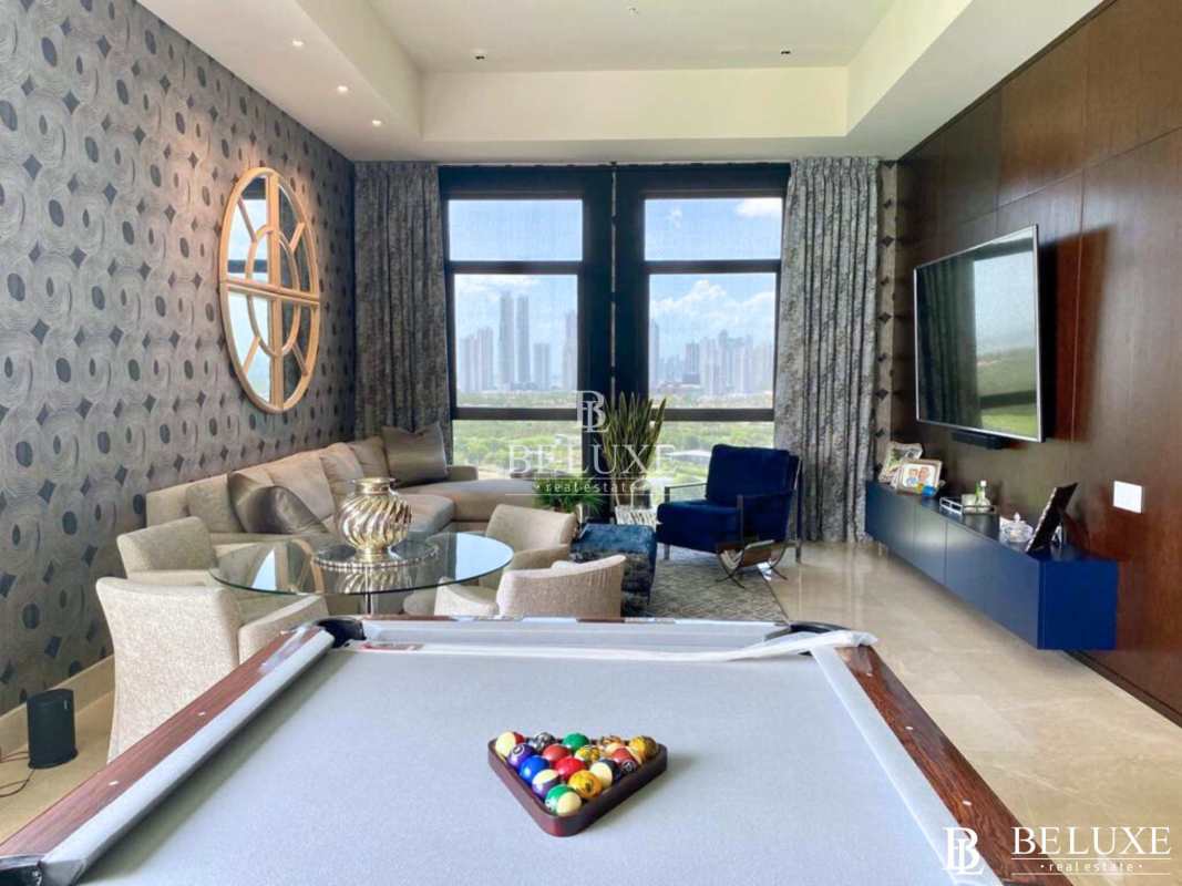 Luxury dining room with marble floors, panoramic golf and city views in penthouse Santa Maria Court Panama
