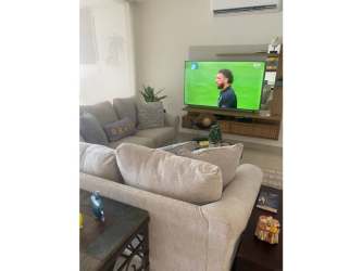 Bedroom with ensuite bathroom and views of beach in Playa Blanca Panama condominium