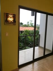 Bright living area with ceramic floors and access to terrace Punta Barco Panama