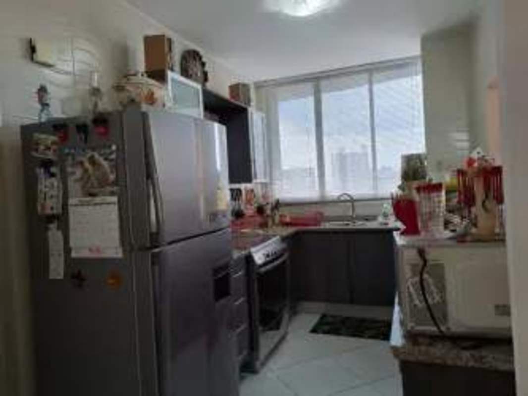 Open living dining area with large windows mural walls and pendant lighting PH Luxor El Cangrejo