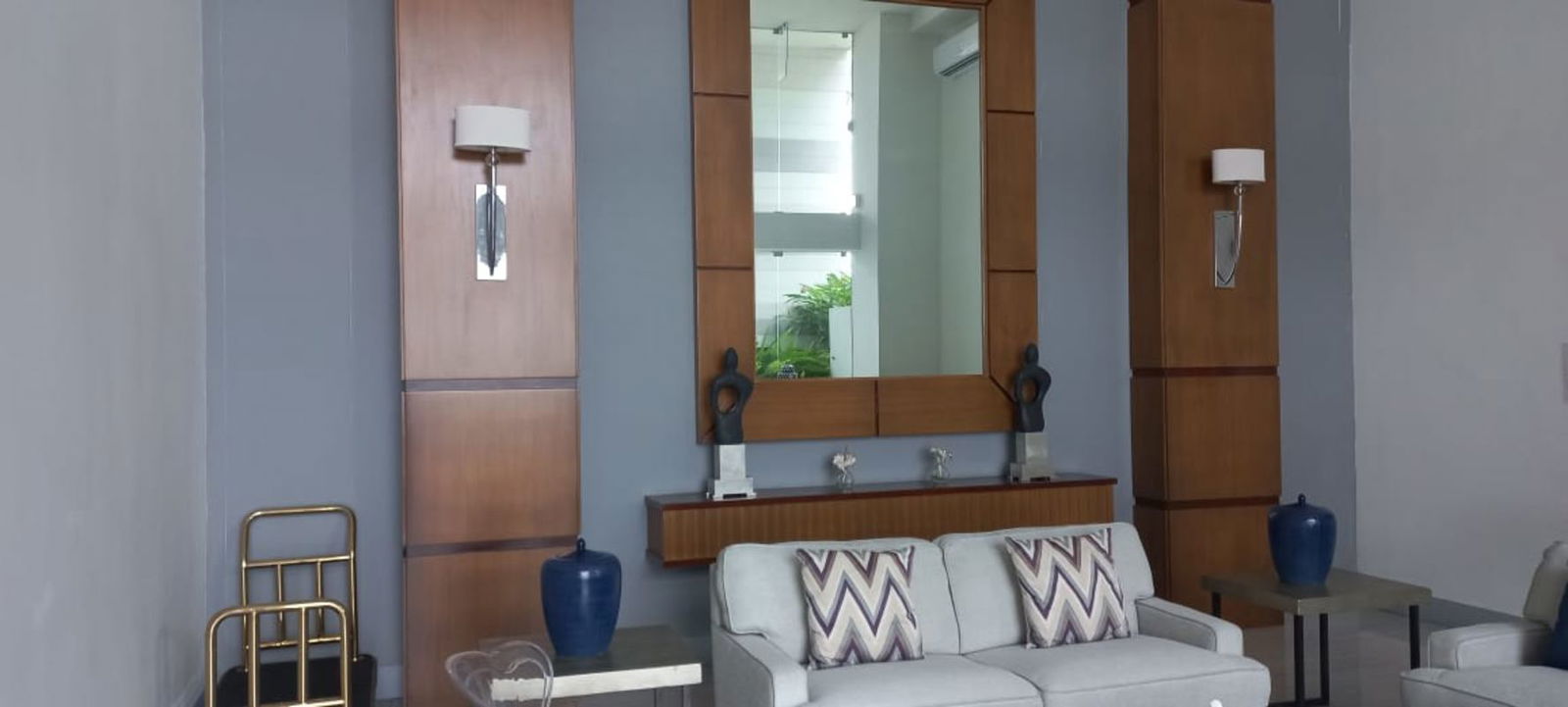 Multi-story condo building with balconies and landscaped entrance PH 4 Horizontes Altos de Panama
