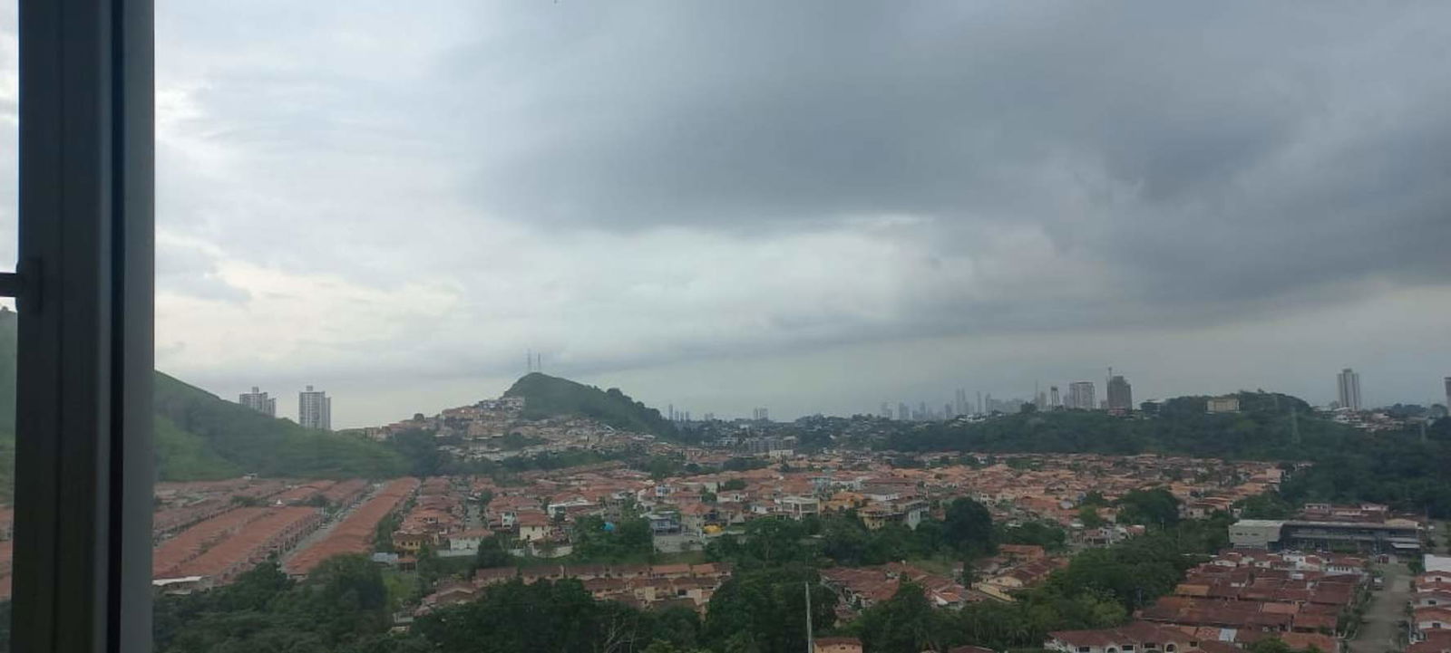 Bedroom with wooden wardrobe and panoramic windows PH 4 Horizontes Panama