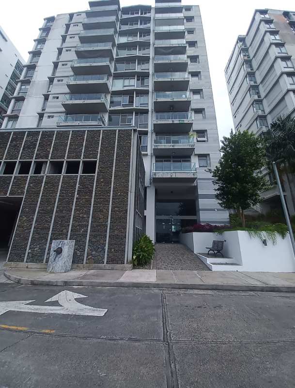 Open modern walk-in closet with shelves and rods in PH 4 Horizontes Altos de Panama City