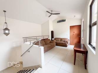 Family house with covered terrace opening to backyard patio in River Valley Panama Pacifico