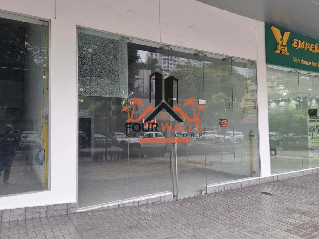 Storefront with glass windows and paved walkway in PH Lemon Tower commercial area Bella Vista Panama