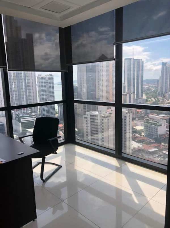 Corner office space with floor to ceiling windows and panoramic city skyline at PH Financial Center Panama