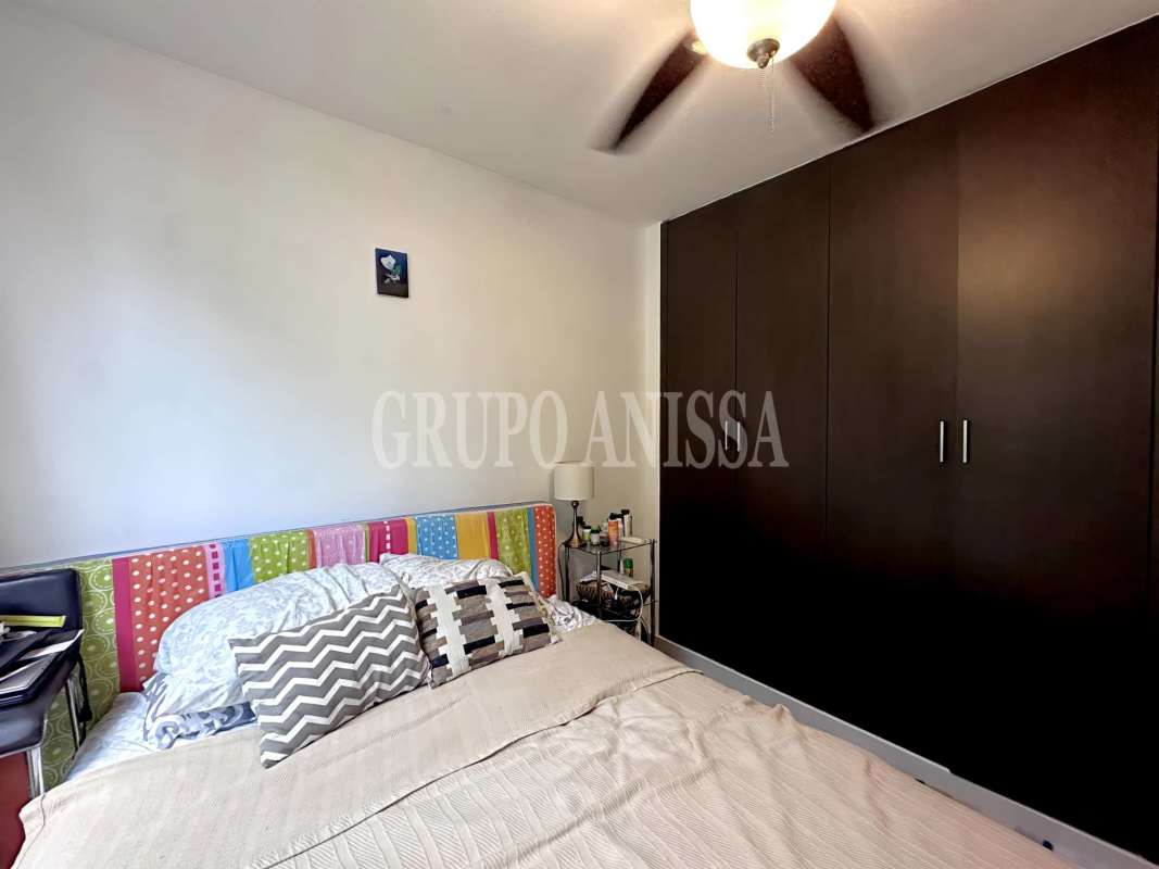 Master bedroom with large windows, walk-in closet, ensuite bath, terrace access in Panama City