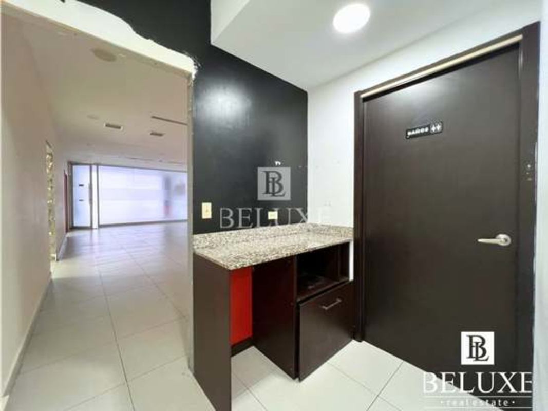 Lobby with glass entrance and frosted panels in commercial building San Francisco Panama