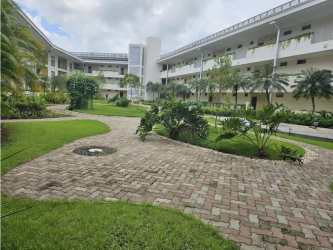 PH Soleo modern facade with balconies surrounded by green landscaping Panama Pacifico