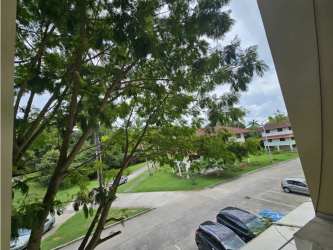 Scenic view of Panama Pacifico neighborhood with green areas and residential buildings