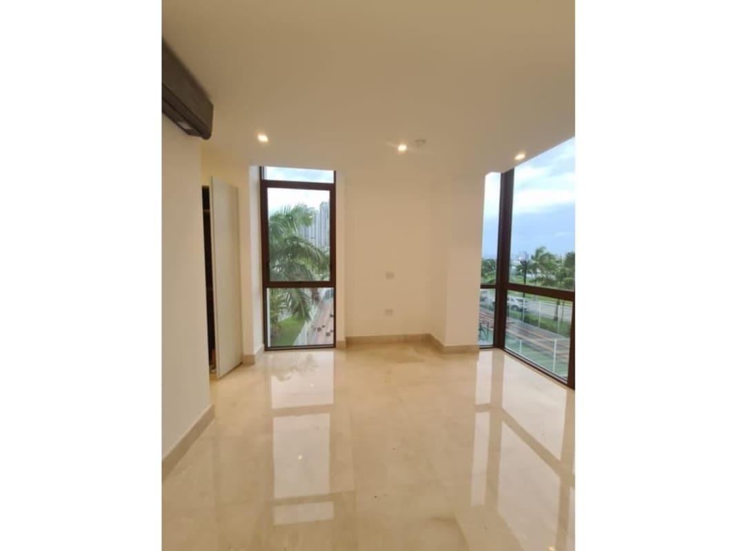 Modern gourmet kitchen with central island, stainless steel appliances, marina view at PH Garden Apartments Panama