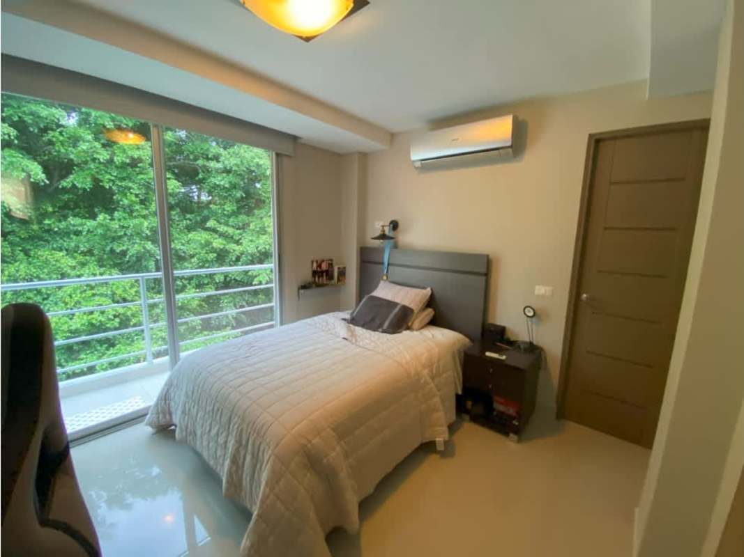 Modern bathroom with walk-in shower vanity and tile accents