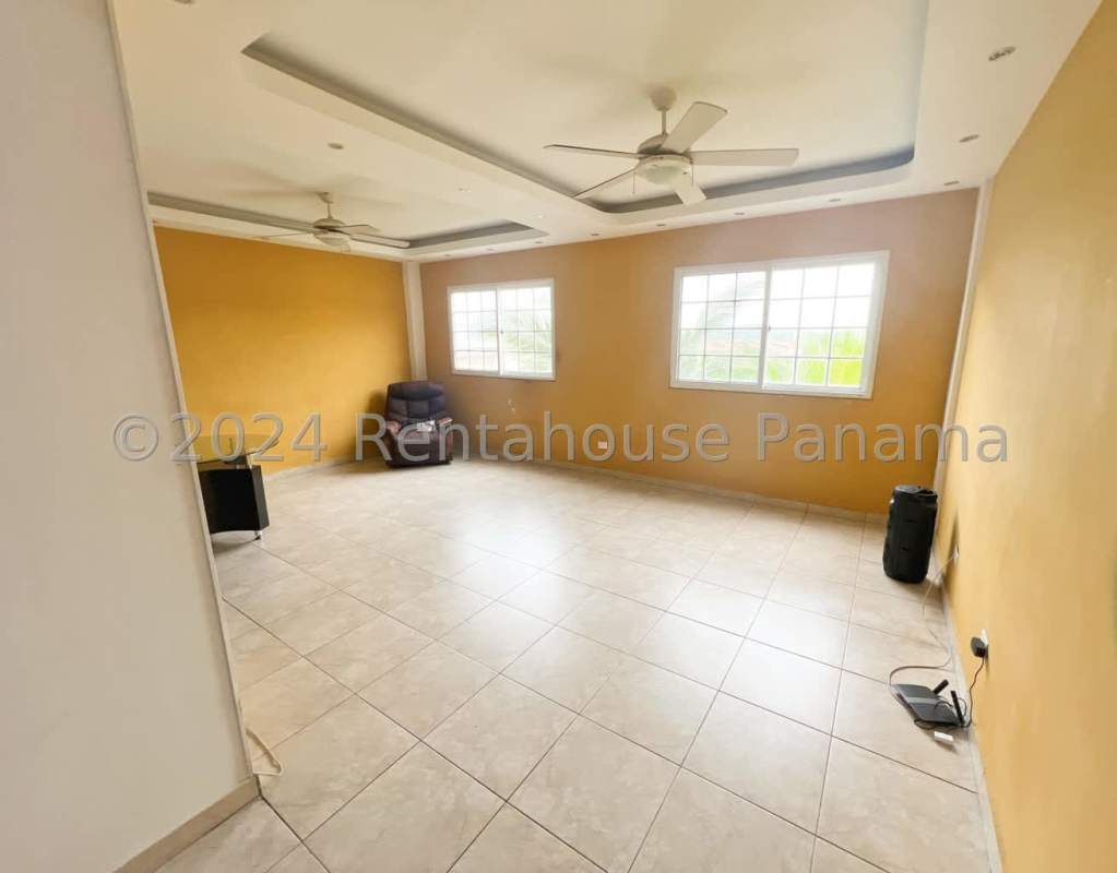 Front view of multilevel townhouse two-car garage in Limajo Condado del Rey Panama City