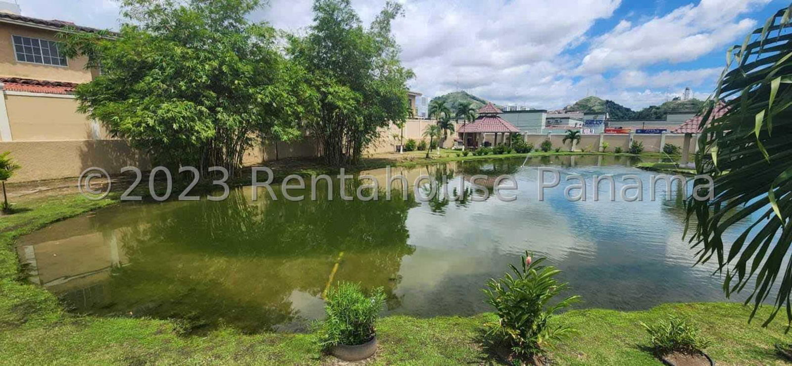 Covered terrace backing onto green yard, fenced, PH Dorado Lakes Condado del Rey