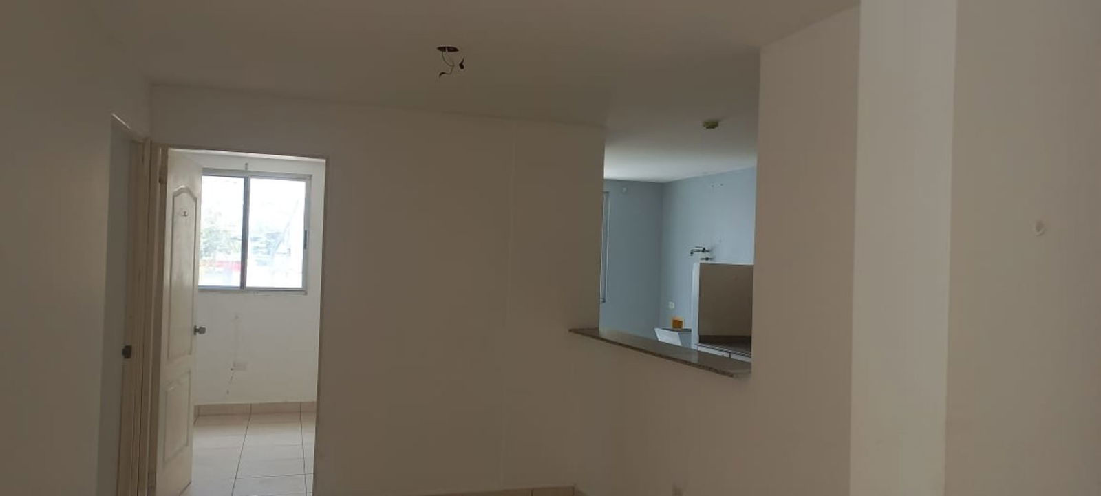 Open plan living dining and kitchen area in PH El Ingenio Gardens Panama