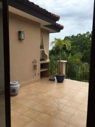 Dining area illuminated by natural light in Buenaventura penthouse luxury rental