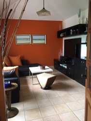 Bright living room with stylish furnishings and golf course views Buenaventura Coclé Panama