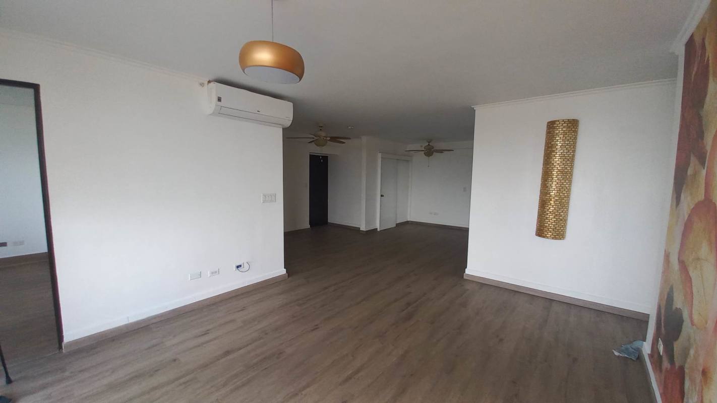 Kitchen with granite countertops, cabinets, gas stove in PH Parques del Carmen Bella Vista Panama City