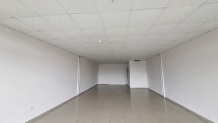 Modern commercial shopping center exterior Plaza Valle Hermoso with parking and large glass facade Arraiján Panama