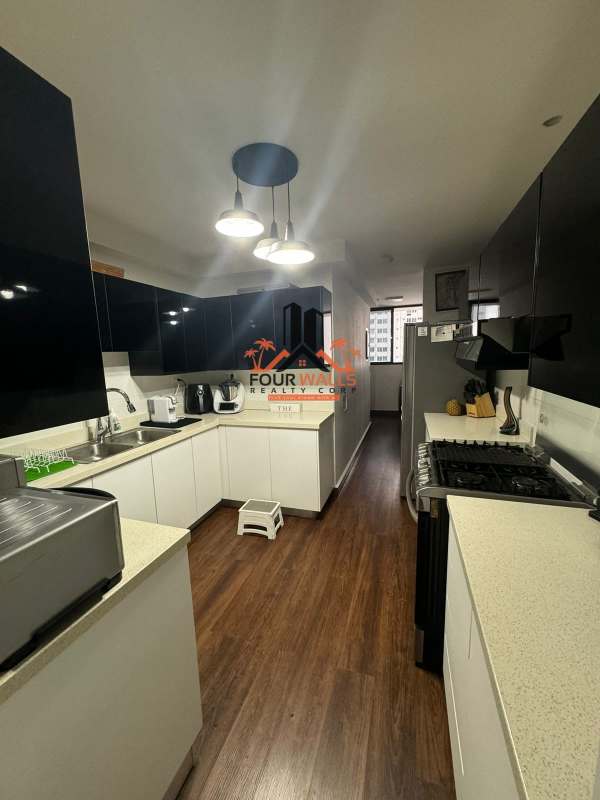 Bedroom featuring closet, AC, wood flooring in PH Balboa Bay Panama City