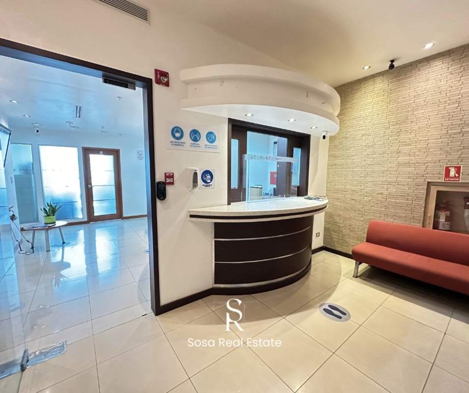 Sleek hallway with frosted glass doors and ceramic tiles in PH Molon Tower Panama