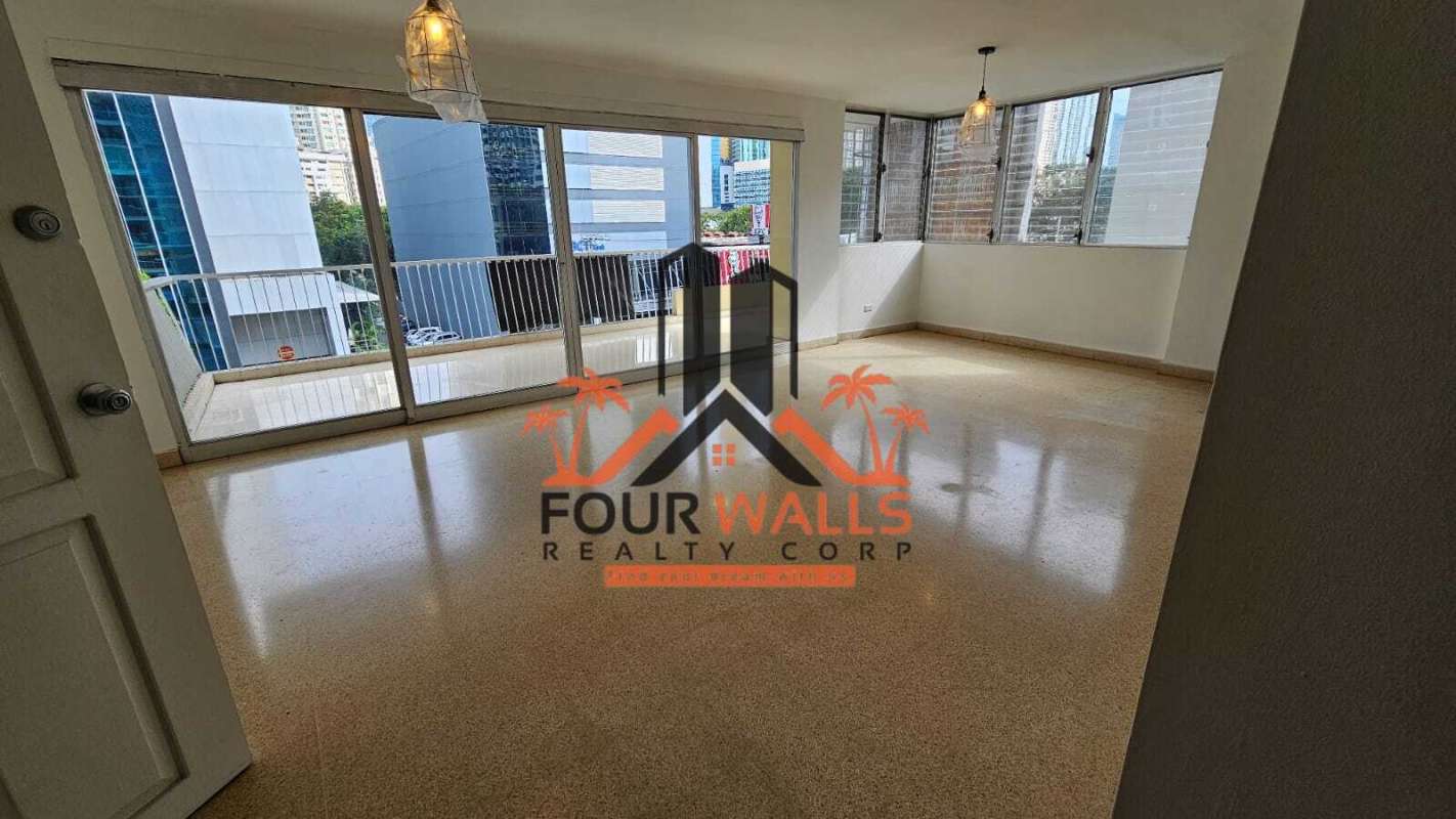 Large living area with sliding doors to balcony in PH Costa del Sol Calle 50 Panama City