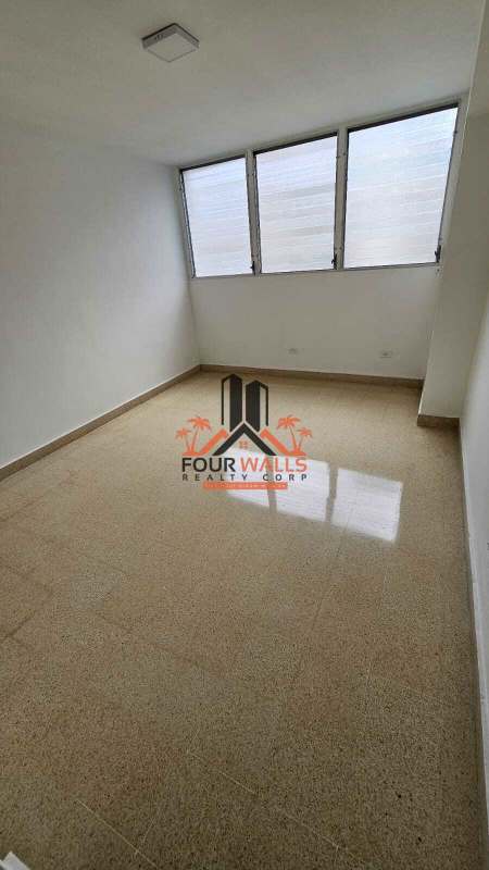 Unfurnished bedroom with big window and neutral tiles in PH Costa del Sol Panama