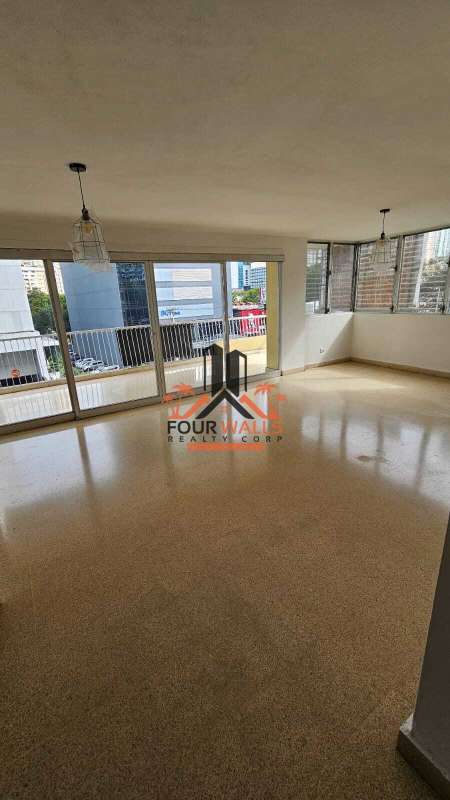 Living and dining area with large windows at PH Costa del Sol Panama