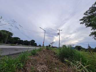Commercial corridor aerial showing lot Rio Hato, Coclé with coast, resorts, airport nearby.