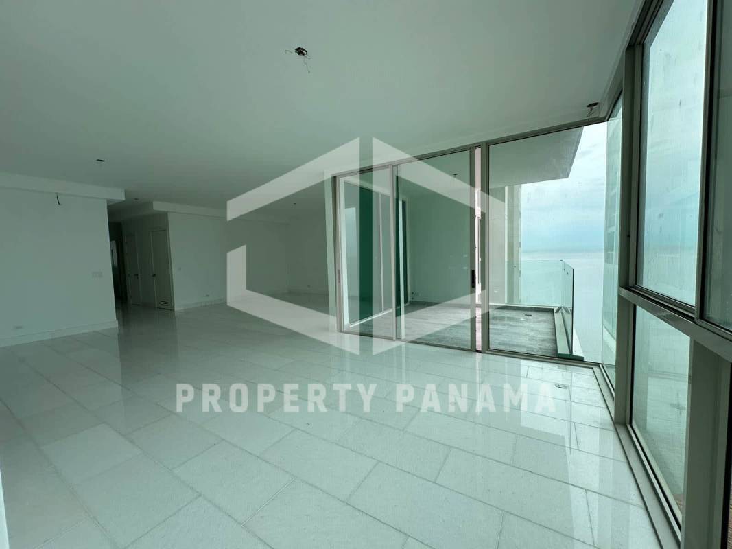 Bright second bedroom with large windows and skyline views PH Pacific Point Panama City