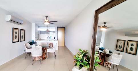 Open-plan kitchen dining with modern finishes at PH Royal Pacific Nueva Gorgona Panama