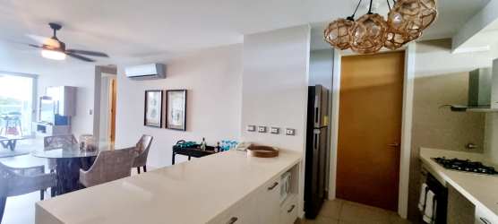 Large open kitchen with island, pendant lights, PH Royal Pacific Gorgona Panama