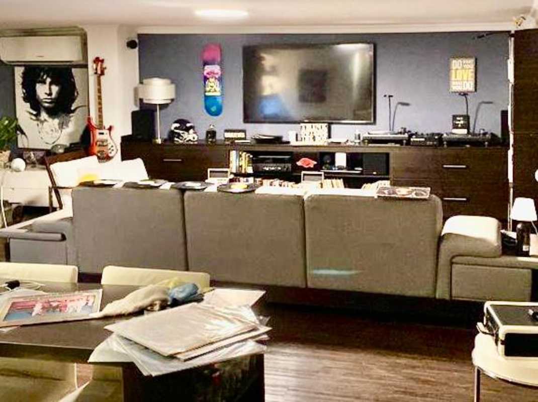 Kitchen with stainless refrigerator, dining area and plants in Villa de las Fuentes Panama City