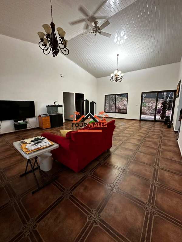 Traditional kitchen with granite countertops wood cabinetry in Albrook house for sale Panama