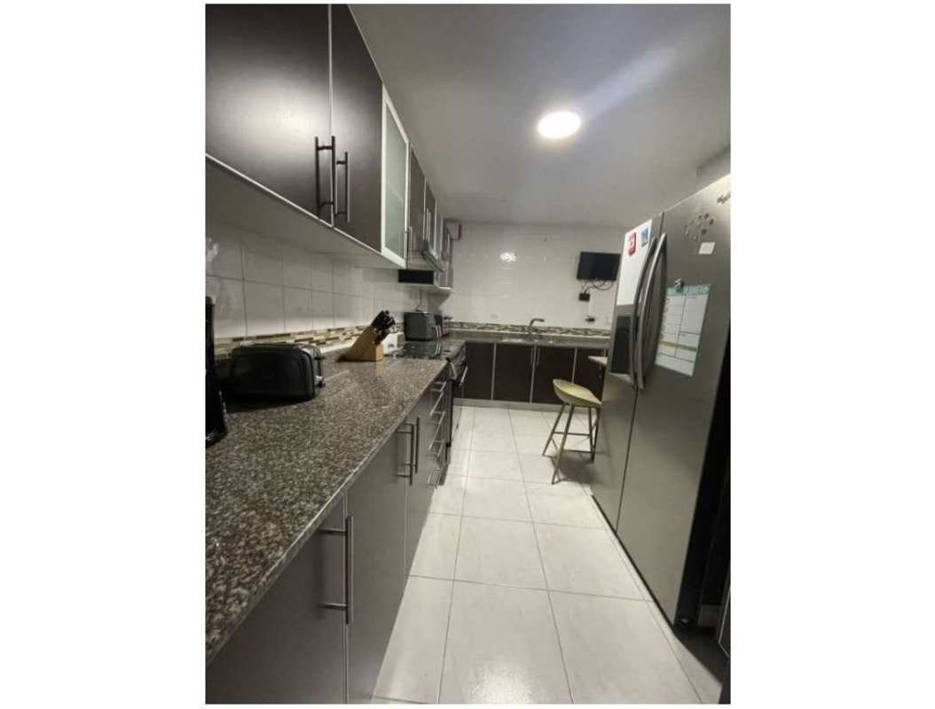 Open living and dining room with balcony access, porcelain floors at PH Brisas Obarrio Obarrio Panama City