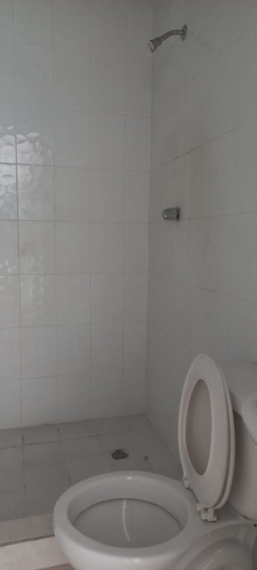 Open plan living and dining room with large windows in PH Ambar Pedregal Panama