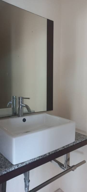 Light-filled living dining space with large sliding doors to terrace in PH Clayton Park I penthouse Panama City