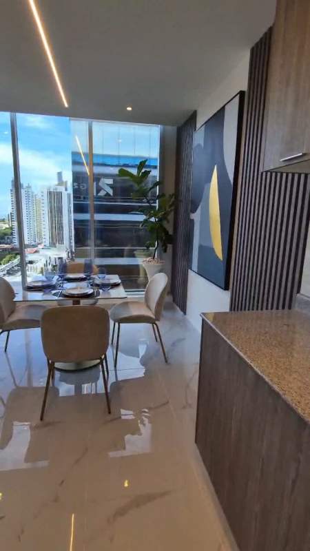 Bedroom with floor-to-ceiling glass corner windows showing Panama City skyline in PH Amazonas Bella Vista