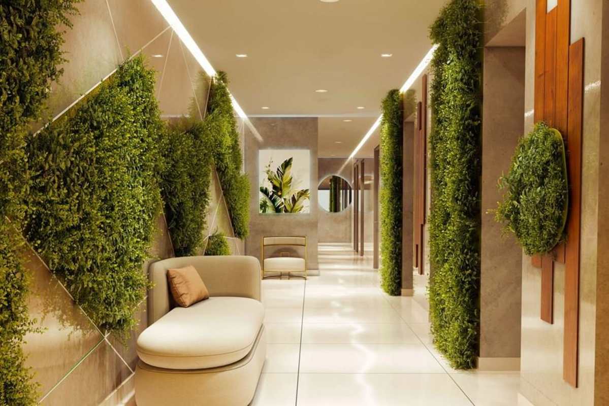 Modern lobby with greenery and seating PH Amazonas apartment Panama City
