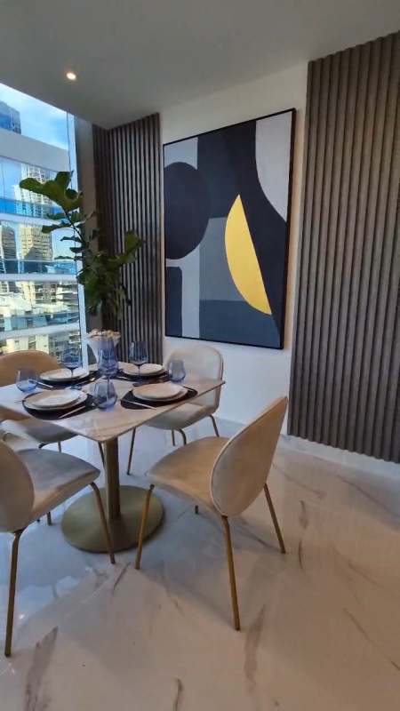 Dining room with large windows overlooking skyline PH Amazonas Bella Vista