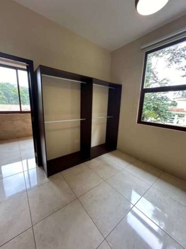 Large bedroom with balcony, garden and rainforest view in luxury villa Clayton Panama
