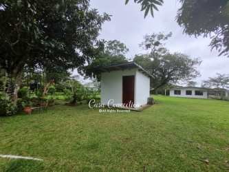 Large open yard with multiple buildings corner commercial property Volcán