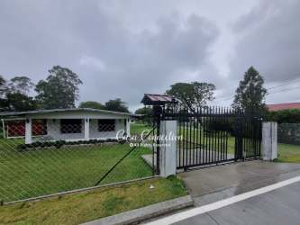 Buildings with fenced yard on large commercial corner lot for sale Volcán Panama