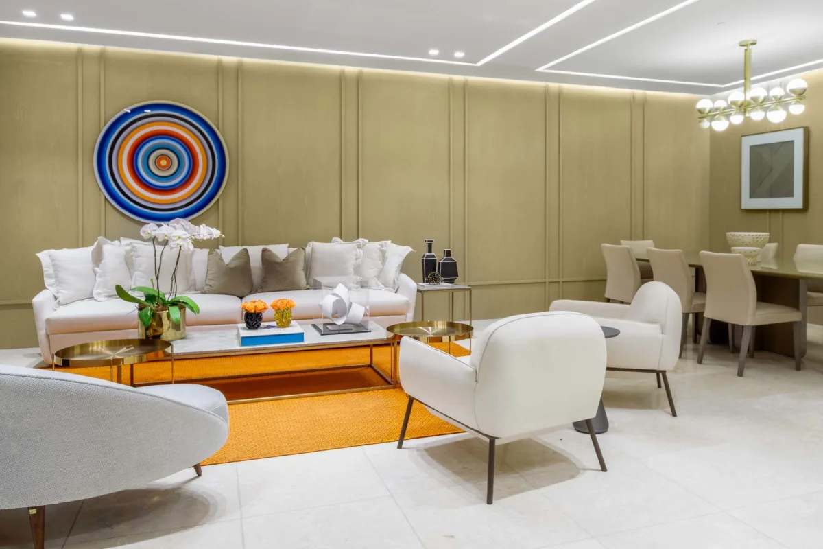 Modern dining area with marble floors, designer lighting, adjacent to living room in PH Deluxe Punta Paitilla Panama