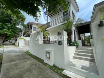 Bright open living room with tile floor connecting to terrace Nativa Panama Pacifico