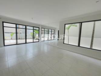 Open kitchen with granite countertops and breakfast area in Nativa Panama Pacifico house