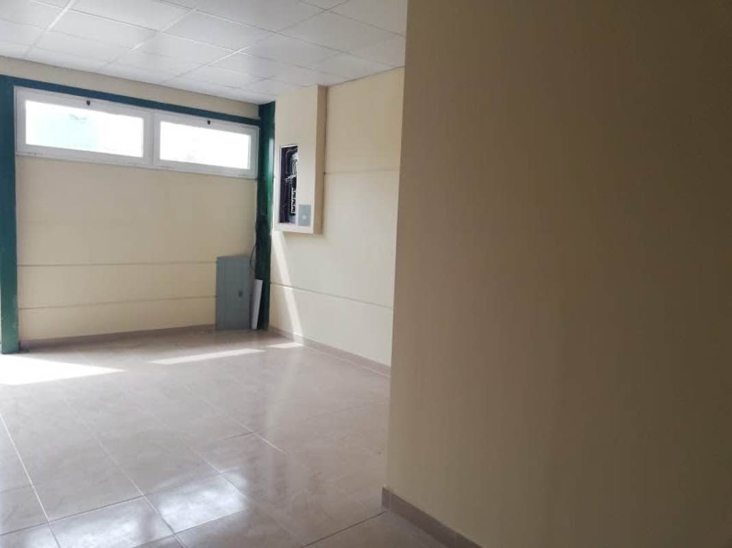 Spacious empty interior of industrial warehouse with concrete floors high ceilings in Panama