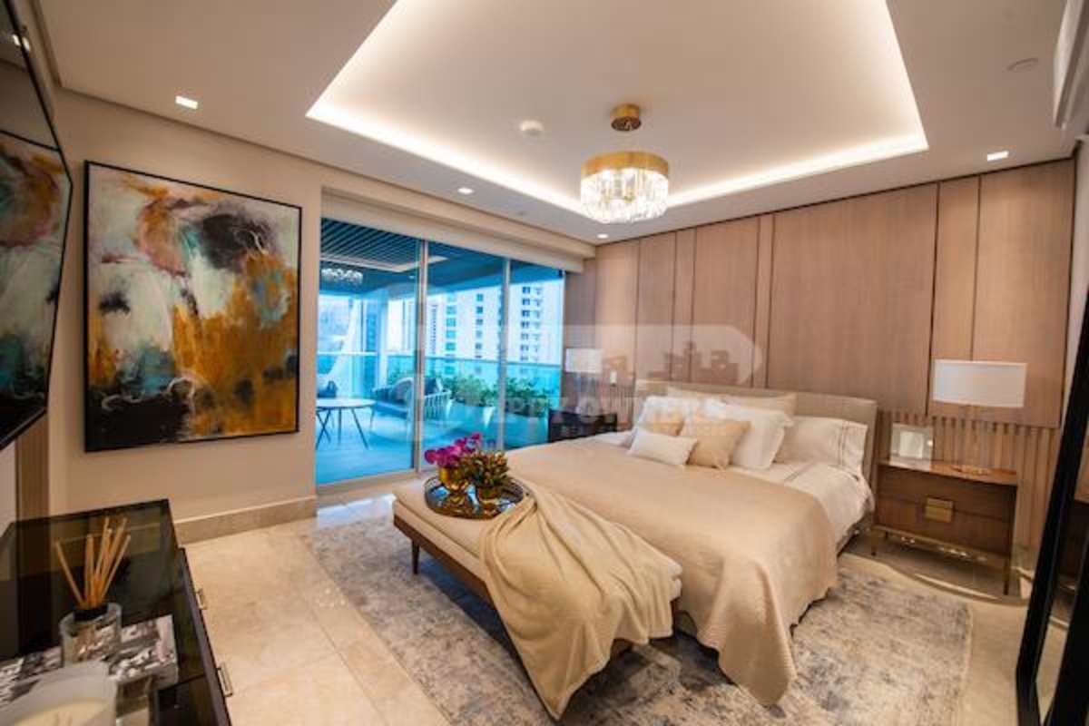 Luxury master bedroom with large window views of ocean, PH Costanera Panama