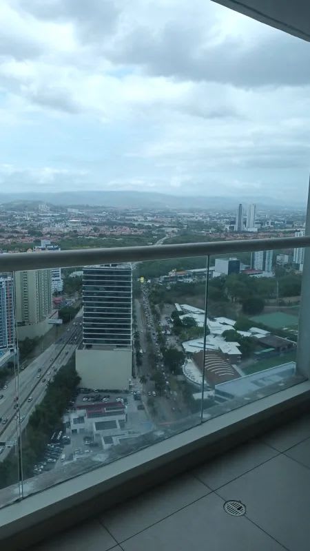 Spacious living and dining area tile floor with balcony access PH The Regent Panama