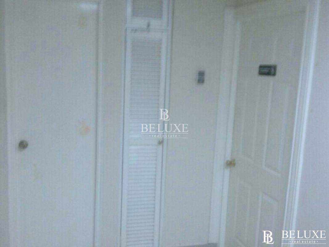 Private office bathroom with pedestal sink and toilet PH Plaza Ejecutiva Panama